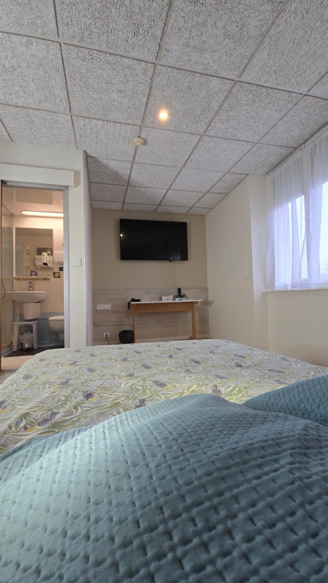 Logis Hotel & Restaurant Arcombelle Монтиньи-ле-Руа Экстерьер фото